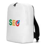 A white SEO Minimalist Backpack standing upright with the acronym "seo" in large, colorful letters on the front. The letter "o" is stylized to resemble a magnifying glass. The backpack has a black zipper and shoulder straps.