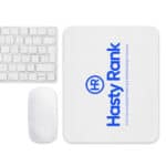 A white computer mouse, keyboard, and a HR PrecisionPad Mouse Pad featuring a logo with the text "hasty rank" and a blue and gray emblem is displayed on a white background.