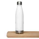 A HR Elite Hydration Flask with a silver cap positioned on a light brown wooden board against a white background. two small blue lights are visible on the sides near the bottom of the bottle.