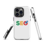Three views of an iPhone®: the front, back, and side. The back showcases a white SEO Tough Case with the word "seo" in green, red, and blue letters, centered around a magnifying glass icon. The phone has a triple-lens camera setup.
